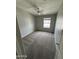 Serene bedroom with neutral walls, soft carpet, and ample natural light at 2402 E 5Th St # 1428, Tempe, AZ 85288