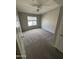 Cozy bedroom featuring a ceiling fan, natural light, and a spacious layout at 2402 E 5Th St # 1428, Tempe, AZ 85288