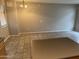Large living space featuring tile flooring, pendant lighting, and neutral wall paint at 2402 E 5Th St # 1428, Tempe, AZ 85288