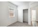 Bright bedroom with carpet, a closet, and a window allowing natural light at 25207 N 183Rd Dr, Wittmann, AZ 85361