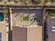 Drone view showcasing the private backyard with desert landscape, patio area, and views at 26743 N 65Th Dr, Phoenix, AZ 85083