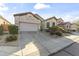 Inviting single-Gathering home with a well-maintained two car garage and a beautifully landscaped front yard at 26743 N 65Th Dr, Phoenix, AZ 85083