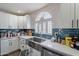 Bright kitchen featuring stainless steel appliances and ample countertop space at 2714 E Valencia Dr, Phoenix, AZ 85042