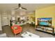 Open floor plan with kitchen, dining area, and living room at 3015 E Sells Dr, Phoenix, AZ 85016