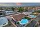 This home's aerial view features a refreshing swimming pool and an outdoor living area at 3121 E Sierra St, Phoenix, AZ 85028