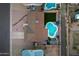 Stunning aerial view of a private pool and backyard oasis, complete with lush landscaping and cozy patio seating at 3121 E Sierra St, Phoenix, AZ 85028