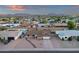 Aerial view of the property, highlighting the backyard, neighborhood, and mountain backdrop at 3121 E Sierra St, Phoenix, AZ 85028