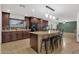 Well-appointed kitchen featuring a center island with counter seating and updated appliances at 3121 E Sierra St, Phoenix, AZ 85028