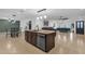 Spacious living area with an open-concept layout, seamlessly connecting the kitchen and dining spaces at 3121 E Sierra St, Phoenix, AZ 85028