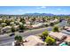 Expansive neighborhood featuring single-story homes, desert landscaping, and views of distant mountains at 3140 N 114Th Dr, Avondale, AZ 85392