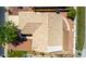 Aerial view of the house showing the roof, landscaping and patio at 3140 N 114Th Dr, Avondale, AZ 85392