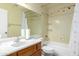 Simple bathroom with a shower, toilet, sink, and a well-lit mirror at 3140 N 114Th Dr, Avondale, AZ 85392