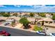 Charming single-story home with a well-manicured front yard, mature trees, and a two-car garage in a suburban neighborhood at 3140 N 114Th Dr, Avondale, AZ 85392
