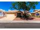 Inviting single-Gathering home with a well-maintained front yard and attached two-car garage at 3140 N 114Th Dr, Avondale, AZ 85392
