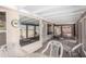 Enclosed patio featuring neutral colors, tables and chairs for relaxing and entertaining at 3140 N 114Th Dr, Avondale, AZ 85392