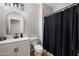 Well-lit bathroom with white vanity, neutral walls, and a modern sink at 3592 E Sandwick Dr, San Tan Valley, AZ 85140