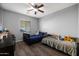 Comfortable bedroom featuring two twin beds and a ceiling fan at 3592 E Sandwick Dr, San Tan Valley, AZ 85140