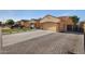 Charming single-Gathering home featuring a two-car garage and a brick paver driveway at 3592 E Sandwick Dr, San Tan Valley, AZ 85140