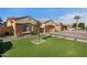 Charming single-Gathering home featuring a two-car garage and artificial turf lawn at 3592 E Sandwick Dr, San Tan Valley, AZ 85140