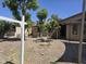 Charming single-story home with a xeriscaped front yard and mature trees at 3621 N 65Th Ave, Phoenix, AZ 85033