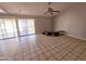 Spacious living room with tile flooring and natural light at 3621 N 65Th Ave, Phoenix, AZ 85033