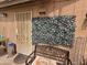 Welcoming patio with comfortable bench seating and charming details at 3621 N 65Th Ave, Phoenix, AZ 85033