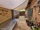 Relaxing outdoor patio space with shaded cover, greenery, and comfortable seating at 3621 N 65Th Ave, Phoenix, AZ 85033