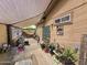 Covered patio area with space for dining and relaxing at 3621 N 65Th Ave, Phoenix, AZ 85033