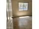 Bedroom featuring neutral walls and tile floors at 3645 N 71St Ave # 28, Phoenix, AZ 85033