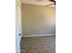 Empty bedroom with tile floors, neutral walls, and a ceiling fan at 3645 N 71St Ave # 28, Phoenix, AZ 85033