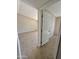 Bedroom view showcasing tile flooring and a door way creating a bright and airy space at 3645 N 71St Ave # 28, Phoenix, AZ 85033