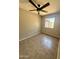 Bedroom featuring neutral walls, tile floors, and a ceiling fan at 3645 N 71St Ave # 28, Phoenix, AZ 85033