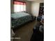 Bedroom with closet and bed at 3645 N 71St Ave # 28, Phoenix, AZ 85033