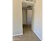 Hallway view with tile flooring leading to other rooms, showing the layout of the house at 3645 N 71St Ave # 28, Phoenix, AZ 85033