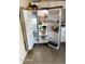 Side-by-side stainless steel refrigerator at 3645 N 71St Ave # 28, Phoenix, AZ 85033