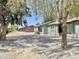 Exterior view of the charming homes with shade trees, sidewalks, and tidy yards at 3645 N 71St Ave # 28, Phoenix, AZ 85033