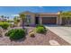 Charming single-story home with a two-car garage and desert landscaping at 3910 N 163Rd Dr, Goodyear, AZ 85395