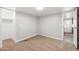Carpeted bedroom featuring an open closet and an entrance to another room at 3925 E Arbor Ave, Mesa, AZ 85206