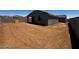 Large lot with a block fence offers potential for a spacious backyard oasis at 4344 E Brook Lynn Pl, San Tan Valley, AZ 85140