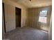 Bedroom with unfinished walls and single window, plus closet, offering a blank canvas for design and customization at 4344 E Brook Lynn Pl, San Tan Valley, AZ 85140