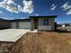 New construction home featuring a three-car garage and modern architectural details at 4344 E Brook Lynn Pl, San Tan Valley, AZ 85140
