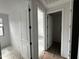 Hallway with doors leading to other rooms in the home at 4344 E Brook Lynn Pl, San Tan Valley, AZ 85140