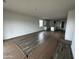 Open-concept living area with tile floors, and view into the kitchen at 4344 E Brook Lynn Pl, San Tan Valley, AZ 85140