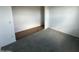 An interior view of a room featuring concrete floors and white walls at 4344 E Brook Lynn Pl, San Tan Valley, AZ 85140