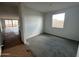 An interior view of a room featuring a window with a view of a backyard at 4344 E Brook Lynn Pl, San Tan Valley, AZ 85140