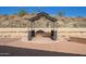 Outdoor barbecue area in a landscaped backyard at 464 W Bismark St, San Tan Valley, AZ 85143