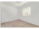 Inviting bedroom with a ceiling fan, a window with shutters, and neutral carpet at 464 W Bismark St, San Tan Valley, AZ 85143