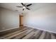 Bedroom with ceiling fan and wood-look floors at 510 E Fremont Dr, Tempe, AZ 85282