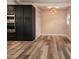 Dining area featuring sleek black cabinets, stainless steel oven and storage at 510 E Fremont Dr, Tempe, AZ 85282