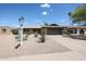 Charming single-story home with a xeriscaped front yard and a two-car garage at 510 E Fremont Dr, Tempe, AZ 85282